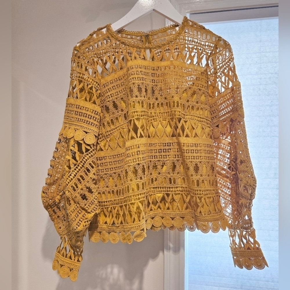 A. Moss blouse in mustard size small